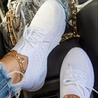 US 10.5 / EU 42 / White