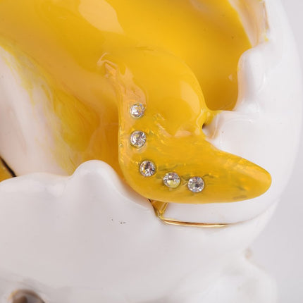 Duck Coming out of Eggshell