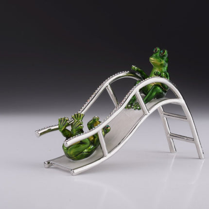 Two Frogs Riding Slide
