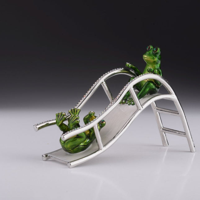 Two Frogs Riding Slide