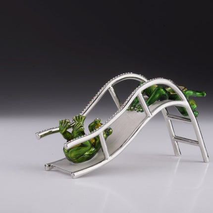 Two Frogs Riding Slide