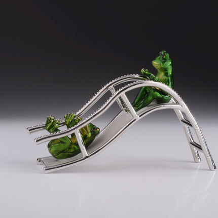 Two Frogs Riding Slide