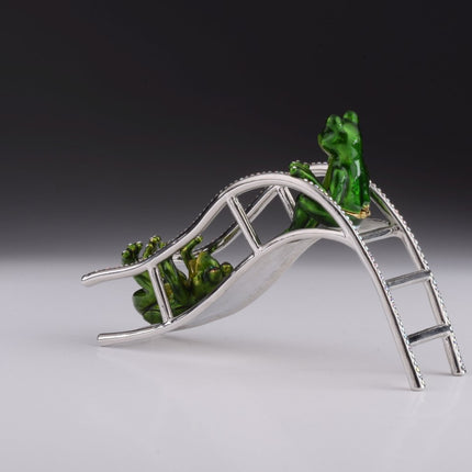 Two Frogs Riding Slide