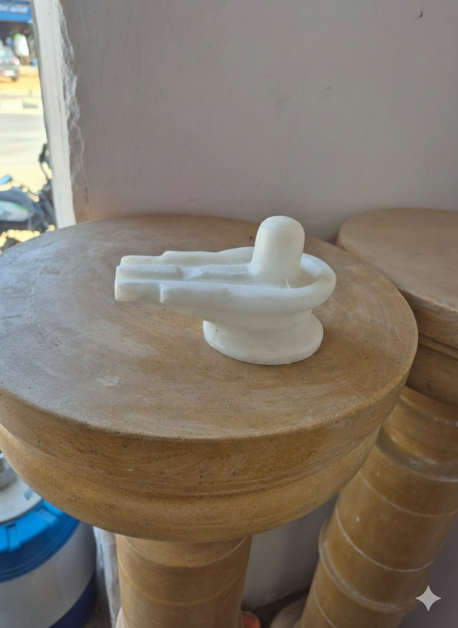 White Marble Shiva Lingam on Wooden Base