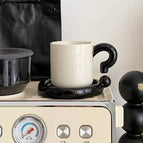 Black Question Mark with Saucer