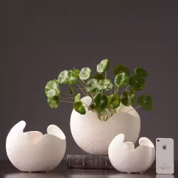 Simple white ceramic vase decoration Simple white ceramic vase decoration